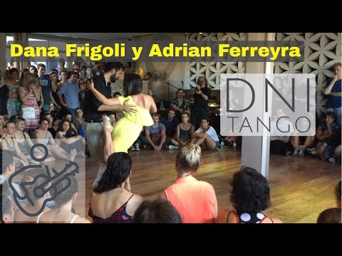  Adrian Ferreyra  and  Dana Frigoli  are  dancing  to  the  tango  "  Quiero Verte Una Vez Mas  "  by  Adolfo Berón  in  2018