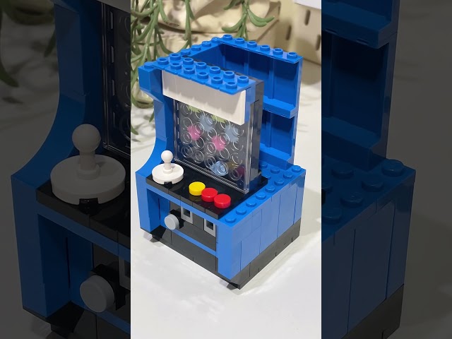 Vídeo relacionado con Max Build More Premium Retro Series 2 Paquete de 2 (Cámara fotográfica y Consola de Juegos portátil) de ZURU: Juguete Sorpresa con Bloques de construcción.