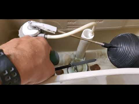 Part of a video titled How to Adjust the Ballcock Valve and Water Level in a Toilet Tank