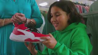 Burlington Grandmother shopping for clothes with her granddaughter