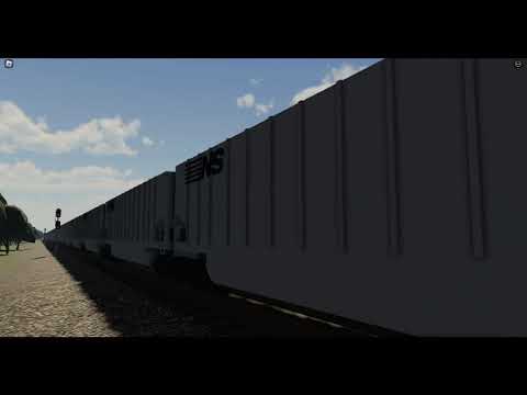 NS 885 following 66X closely at CP 397. (SLD)