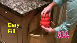 Hračka Kong Dog Wobbler, plniaca, červená, plast,  L