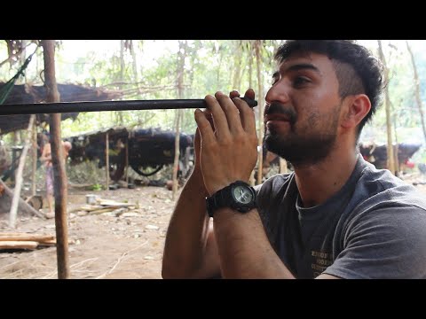 Taking the entheogenic "yopo" with my Yanomami family in the Amazon rainforest.