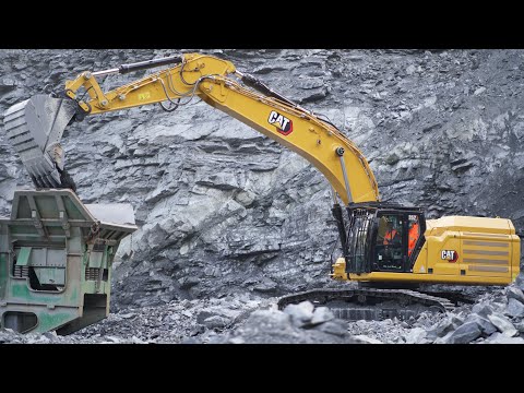 Next Gen Cat 352 Excavator Loading Crusher