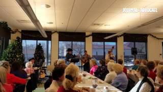 The Prairie Pickers provide entertainment at Sterling Public Library's Christmas Tea.