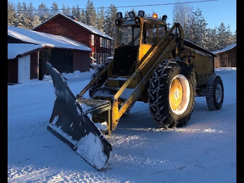Snow Plowing forest road & yard with my Volvo LM225  New snow blower and drive way clearing