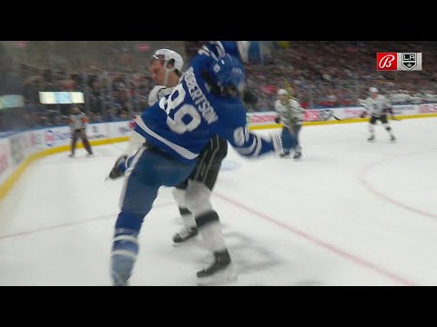 Nicholas Robertson leaves the game after taking a hit from Matt Roy, who goes off for interference.