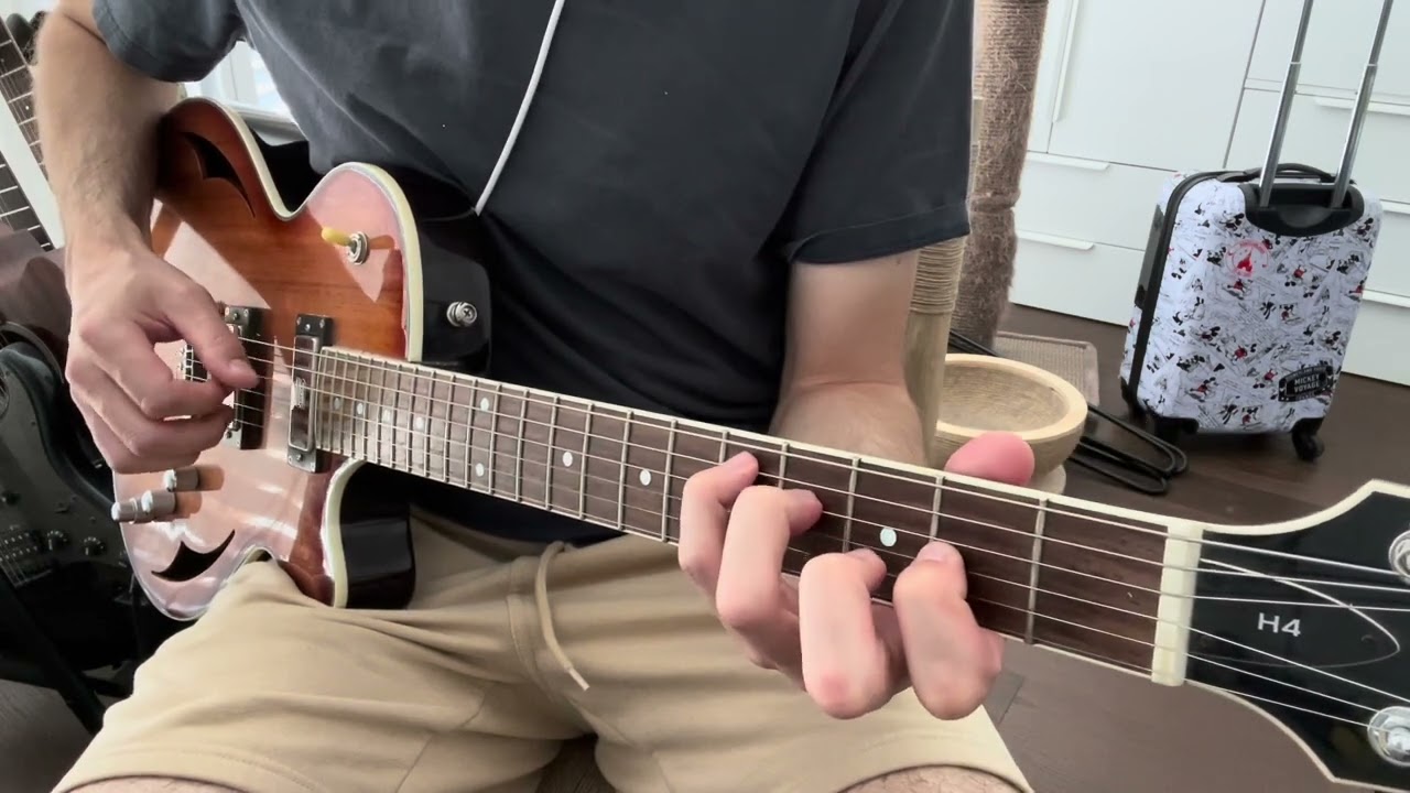 Roberto Barlocci playing a fingerstyle chord-melody arrangement of Nights In White Satin on solo guitar