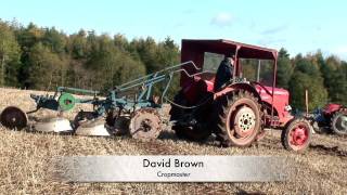 Plow to the end of the row.Vintage tractors ploughing  in sunny Berickshire