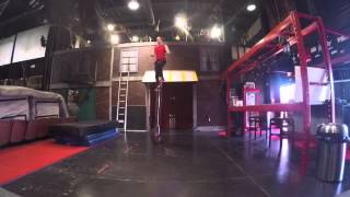 Riding 10 foot Unicycle and Juggling Knives