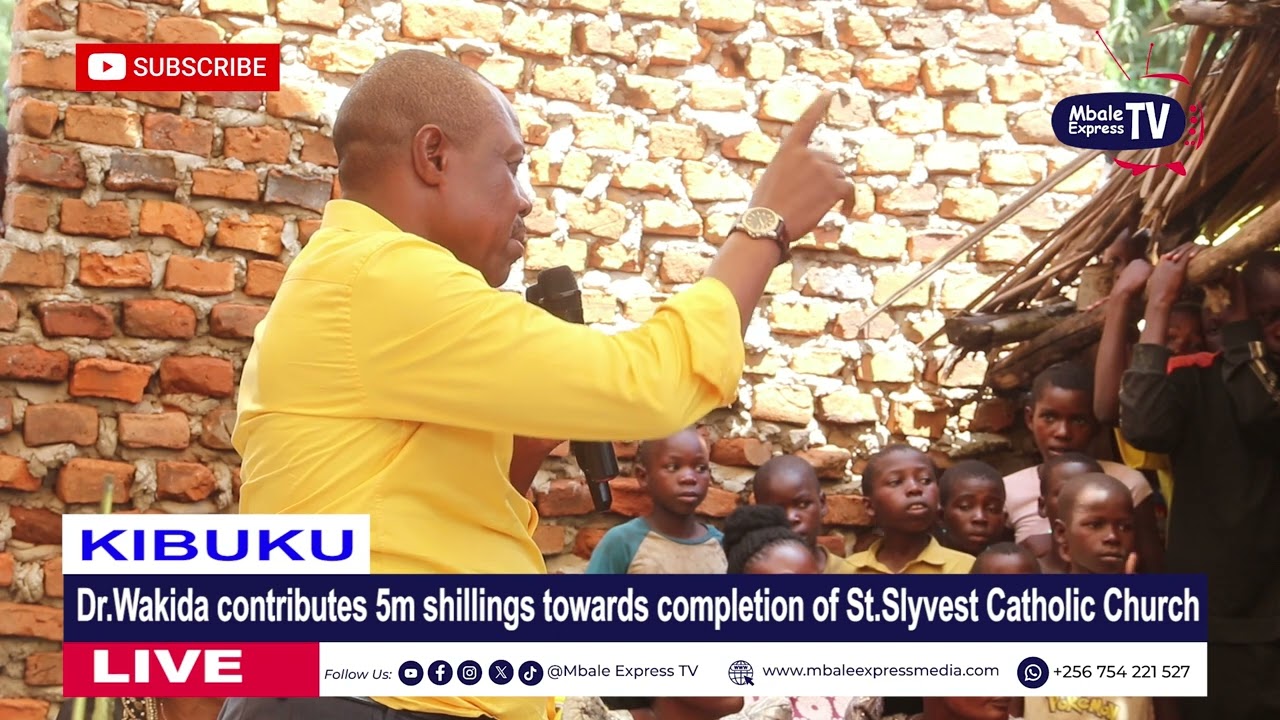 Dr. Wakida Contributes 5 million shillings cash towards completing construction of  Churc