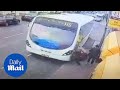 Shocking moment shuttle bus sends pedestrian flying across pavement