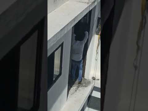 Man Rescued Kitten from top floor of building  (successful kitten rescue video)