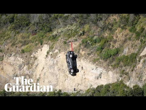Cars washed out to sea on Great Ocean Road during flash flooding recovered by helicopter