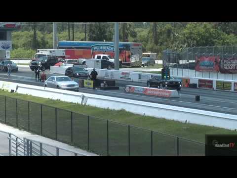 Supercharged Camaro SS vs Tuned 2012 Mercedes Benz S550 - Drag Race Video - Road Test TV ®