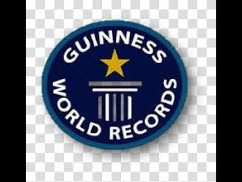 He JUGGLED and SOLVED 3 Rubik's cubes! - Guinness World Records