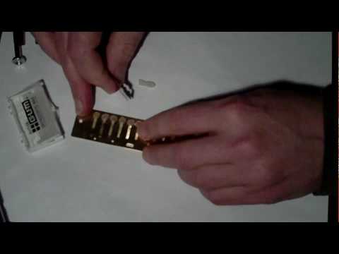 waxing the rivet end - harmonica customization - overblow.com