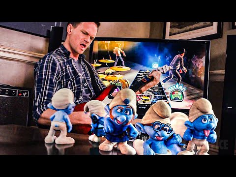 He plays Guitar Hero with The Smurfs 🔥