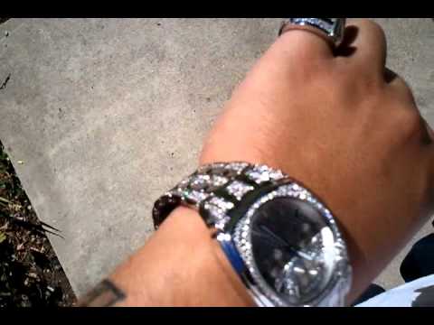 white gold watch with diamonds and pinky ring