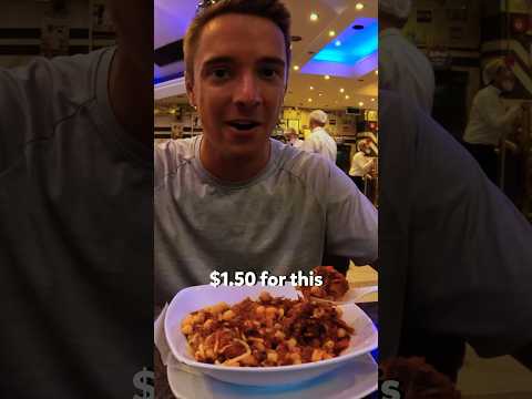 Trying Egyptian Koshari at Abou Tarek in Cairo!