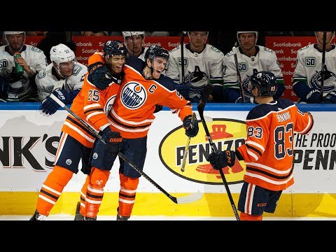 Oilers celebrate season-opening victory over Canucks