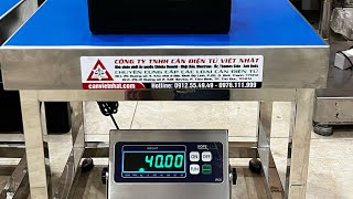 Cân bàn chân ghế Inox chồng nước