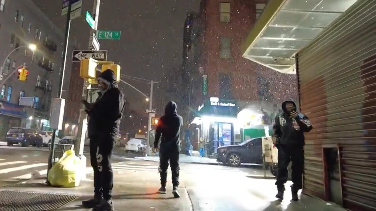 SNOW AT NIGHT IN HARLEM NEW YORK