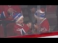 Young Hockey Fan Flips Out When Player Tosses Him a Puck