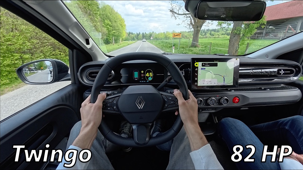 2026 Renault Twingo E-Tech Electric in black driving on Slovenian roads during the JR Car Reviews first drive session at the factory