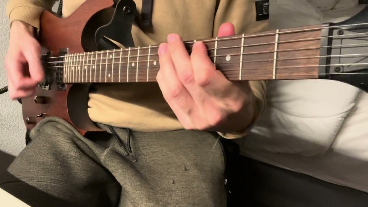 Roberto Barlocci playing the main riff of Arctic Monkeys' Brianstorm on electric guitar