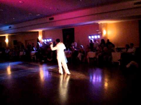  Andrea Misse  and  Javier Rodriguez  are  dancing  to  the  tango  "  En Esta Tarde Gris  "