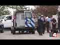 Police raid condemned apartments, remove at least 60 people
