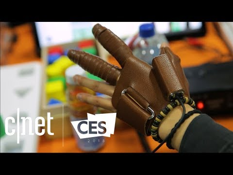This glove helps paralyzed hands move again