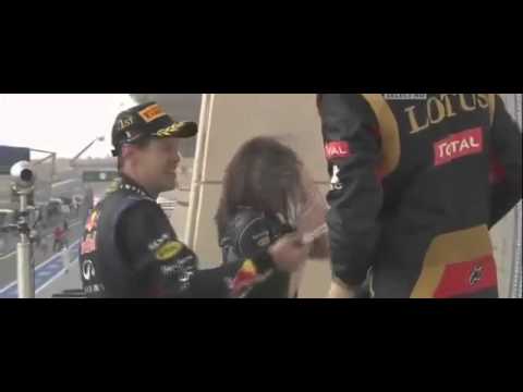 F1 Bahrain GP 2013 - Sebastian Vettel gives to a woman drinking champagne after winning  Bahrain Grand Prix 2013