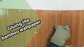 The bamboo wall protectors are brown in colour, with bamboo on one side and textile on the back to hold the sticks together. Bamboo wallpaper is easiest to fix to the wall with wood glue.