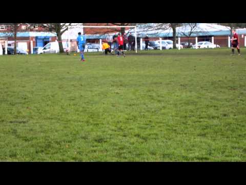 FC Glades' Bonar sees a volley well saved by Droitwich's Oliver