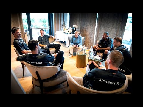 High-ranking visitors at the training camp: The footballers and the Chancellor