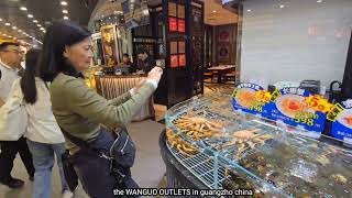 from sofitel sunrich to MANGUO OUTLETS in guangzho china with my wife berna baro