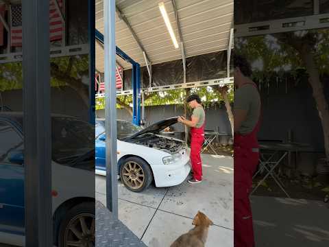 Crazy how heavy stock OEM hoods are compared to carbon fiber. #car #diy #automobile #shortsfeed