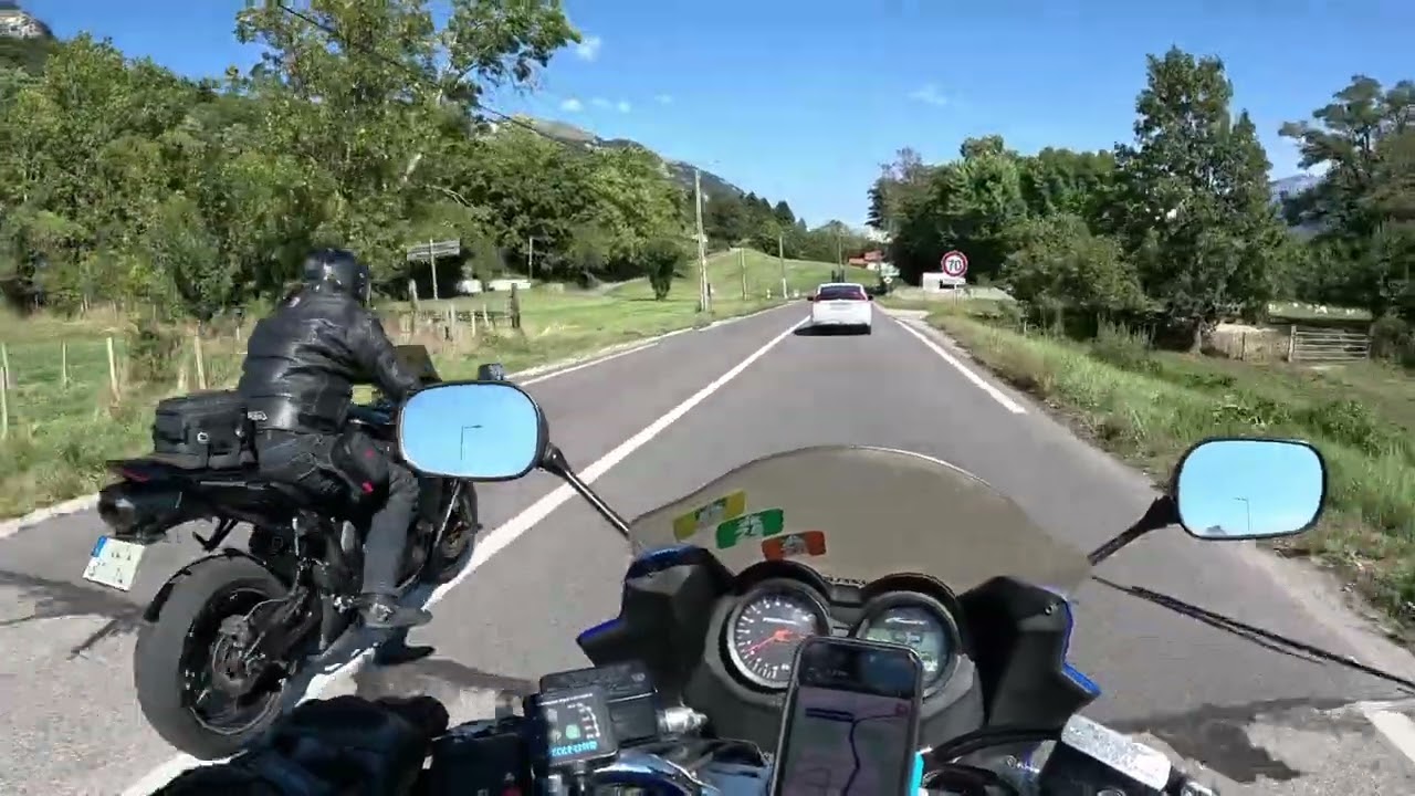 Motorcycle POV riding in French Alps