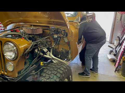 1978 CJ-5 with an AMC 360 V8 Running open Hedman Headers