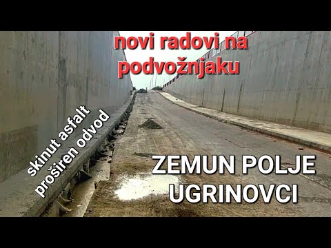 POČELI RADOVI NA PODVOŽNJAKU KOJI POVEZUJE ZEMUN POLJE I UGRINOVCE,SKINUT ASFALT I PROŠIREN SLIVNIK