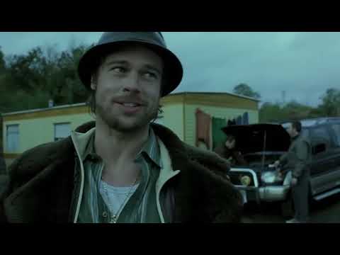 Snatch trailer frame: slow-motion crowd roar as the final bout flips, music surges