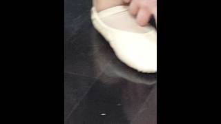 How should ballet shoes fit?