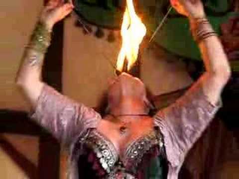 Belly Dancer swallows fire
