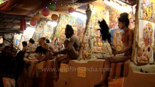 Hindu saints smeared with ash on face performs ritual