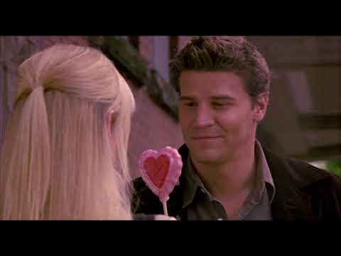 Official trailer frame for Valentine (2001) with the porcelain Cupid mask and red rose motif