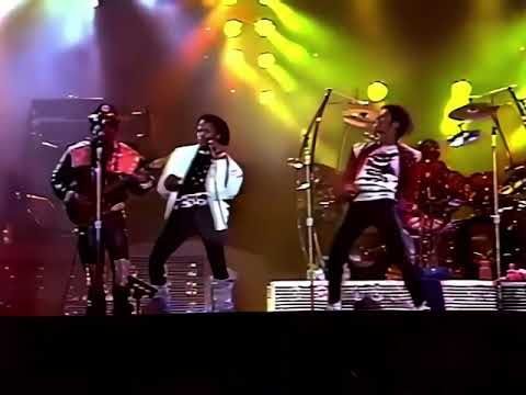 Michael and Marlon Jackson dancing together