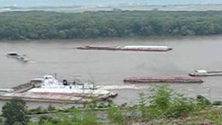 Barges floating down Mississippi River