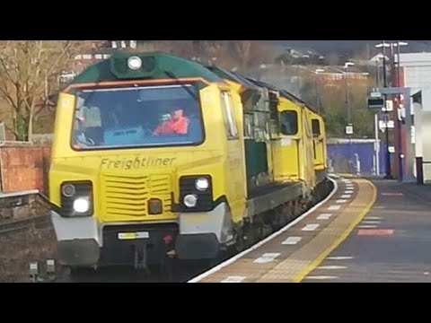 70011 and 70006 charge past Stalybridge with 608M, Hunslet yard to Crewe.